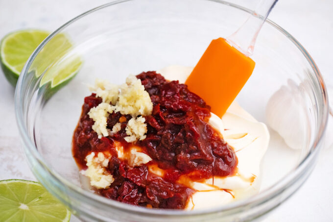 Mixing the ingredients for creamy Chipotle sauce.