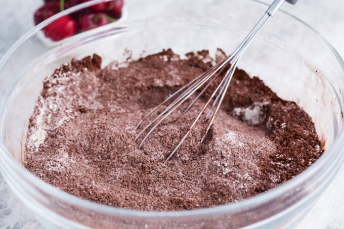 Mixing dry ingredients for chocolate cake layer.