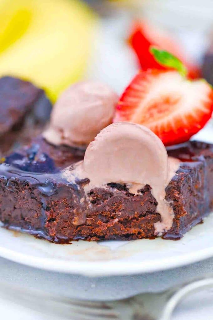 vegan no added sugar brownies topped with chocolate
