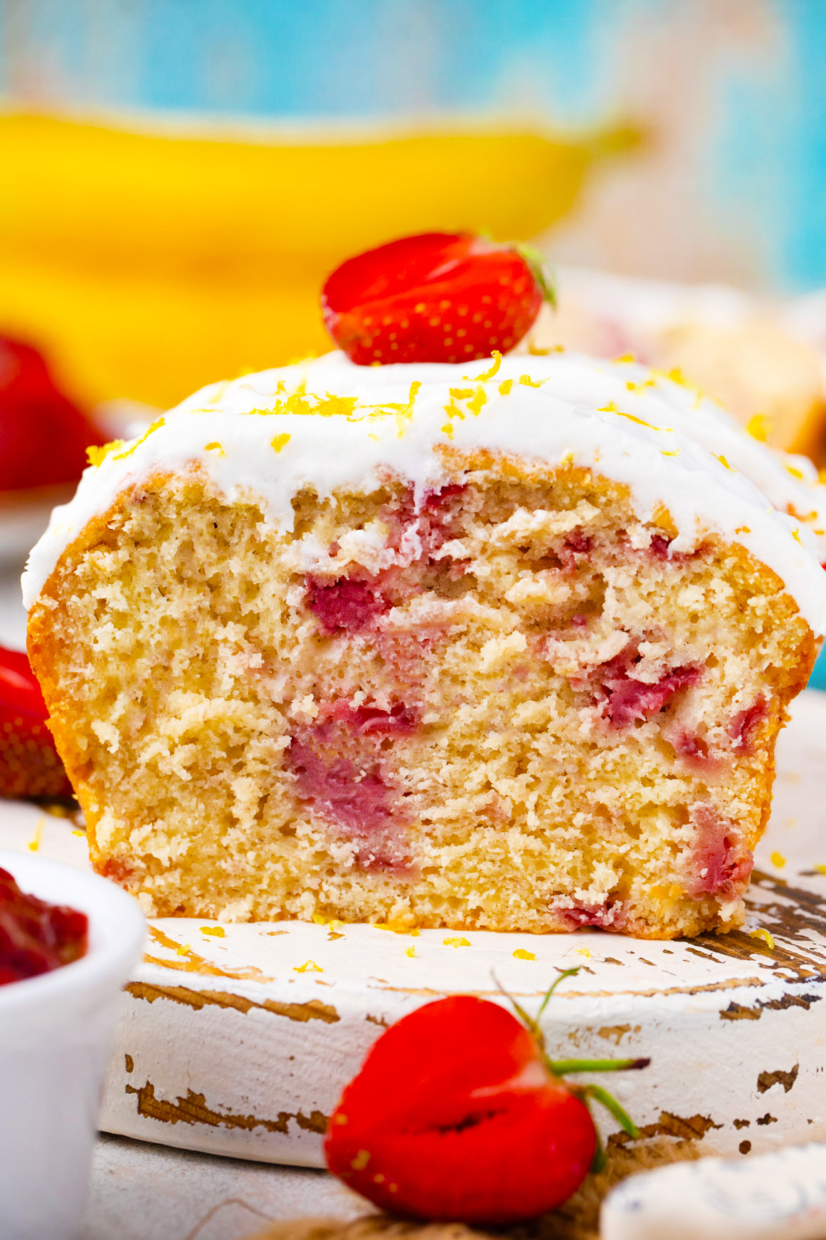Frontal shot of strawberry banana bread loaf.