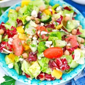 a plate of chopped mediterranean salad