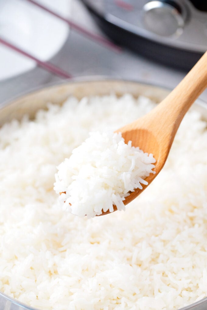 A spoonful of white rice cooked in the Instant Pot.