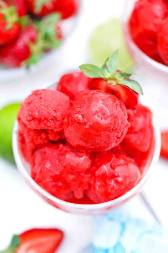 strawberry sorbet served with mint leaves