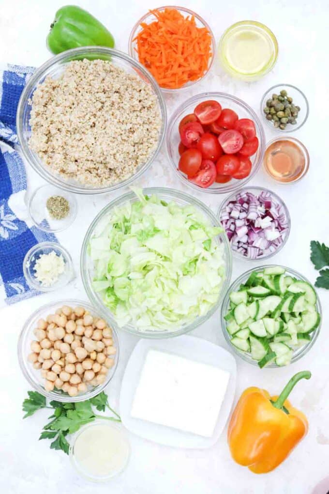 overhead shot of ingredients to make mediterranean grilled feta quinoa salad