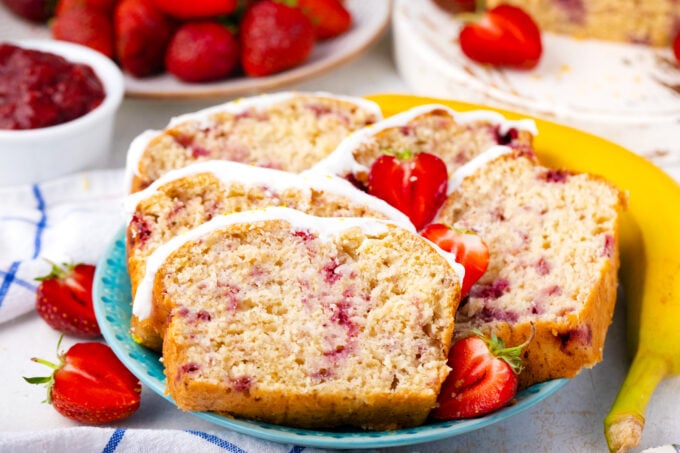 Strawberry banana bread slices on a plate.