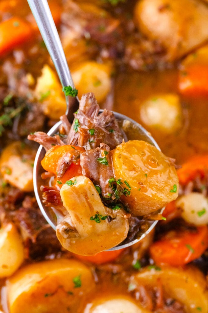 Instant Pot beef stew with veggies and herbs.