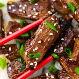chopsticks holding korean bbq beef
