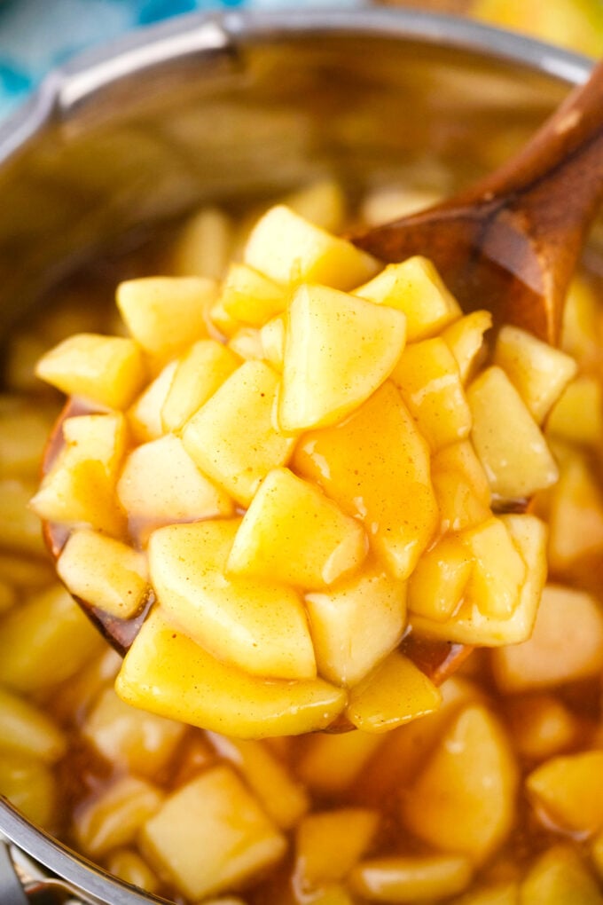 A large spoonful of apple pie filling.