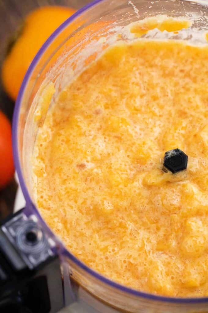 pureed persimmons in a food processor