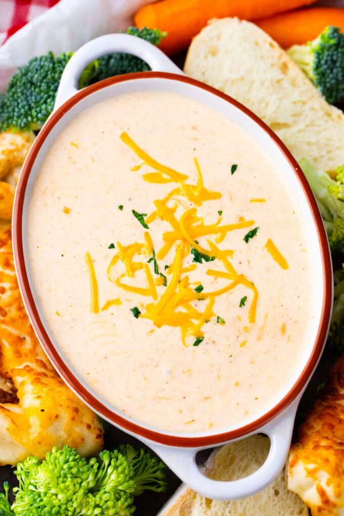 Overhead shot of beer cheese dip served with veggies.