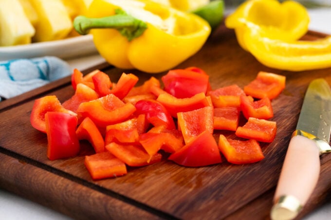 Chopped bell peppers on a cutting board.
