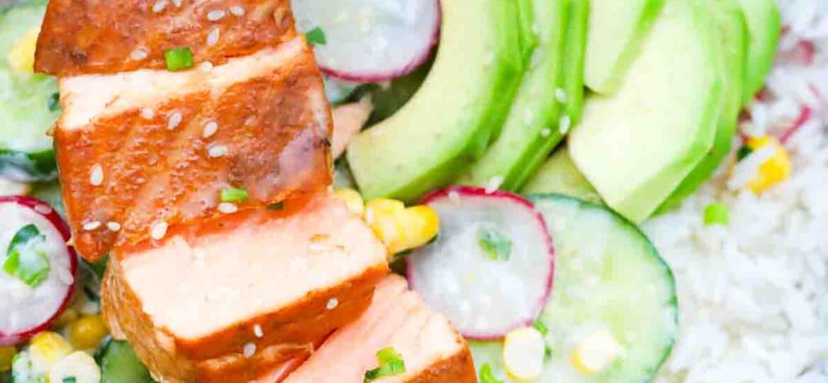 cucumber miso salmon rice bowls topped with avocado and radish