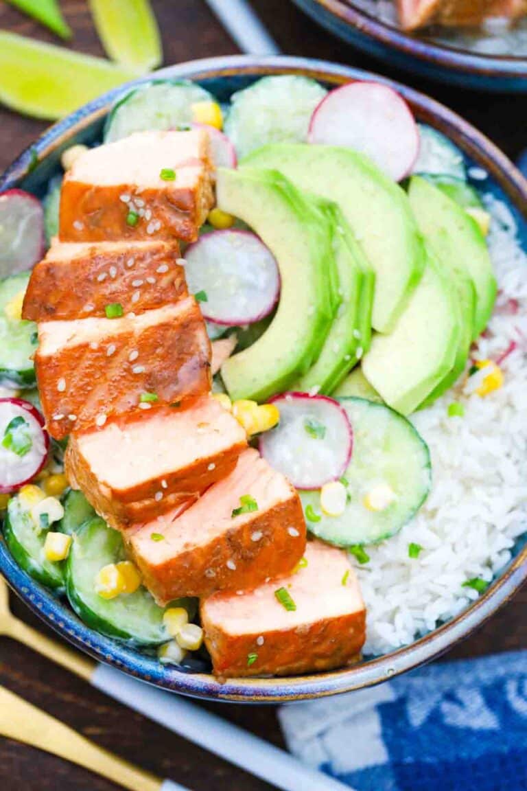 cucumber miso salmon rice bowls topped with avocado and radish