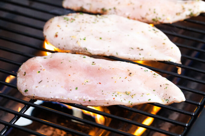 Grilling chicken breasts.