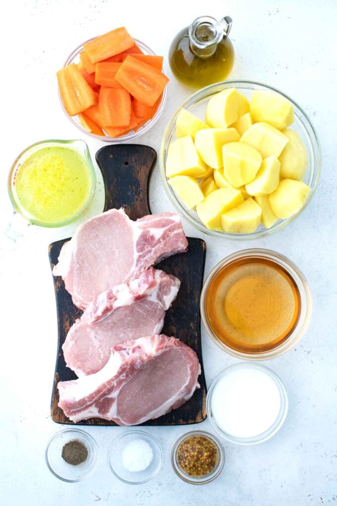 instant pot apple cider pork chops ingredients in bowls on a table