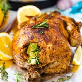 juicy and browned instant pot whole chicken on a baking sheet