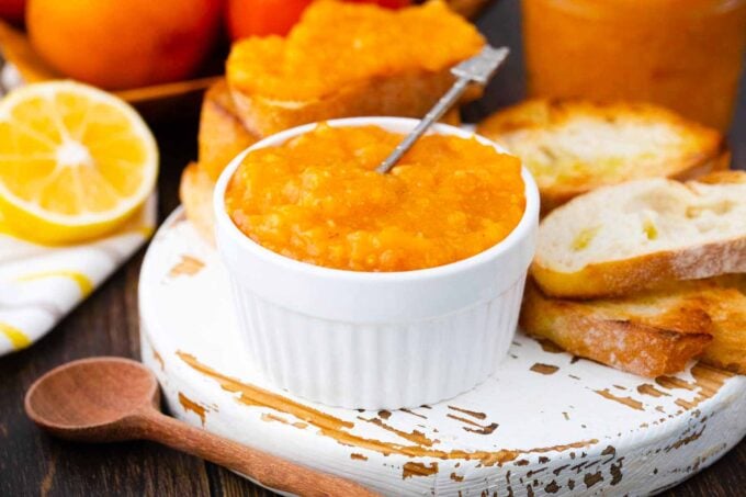 persimmon jam with toast next to it