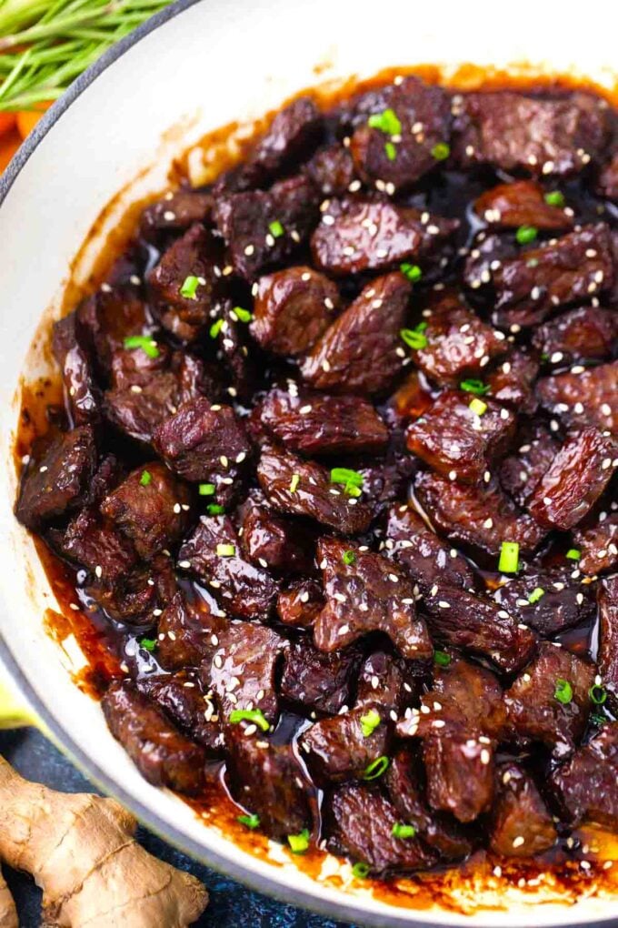 overhead shot of a skillet with crispy sticky honey garlic beef