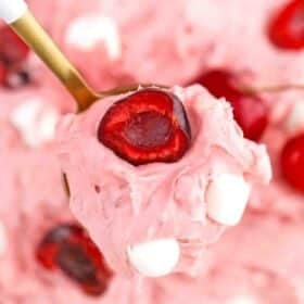 macro shot of a spoonful of cherry cheesecake fluff