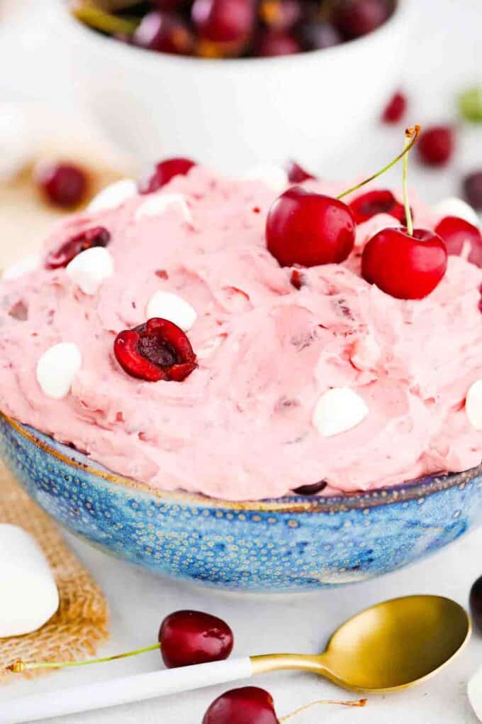 a bowl of cherry cheesecake fluff