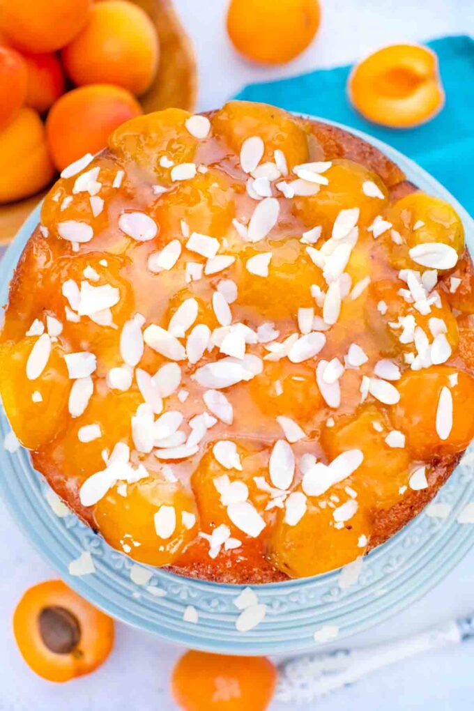 overhead shot of german almond apricot cake topped with slivered almonds