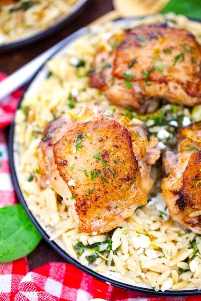 overhead shot of perfectly browned one pan chicken and orzo