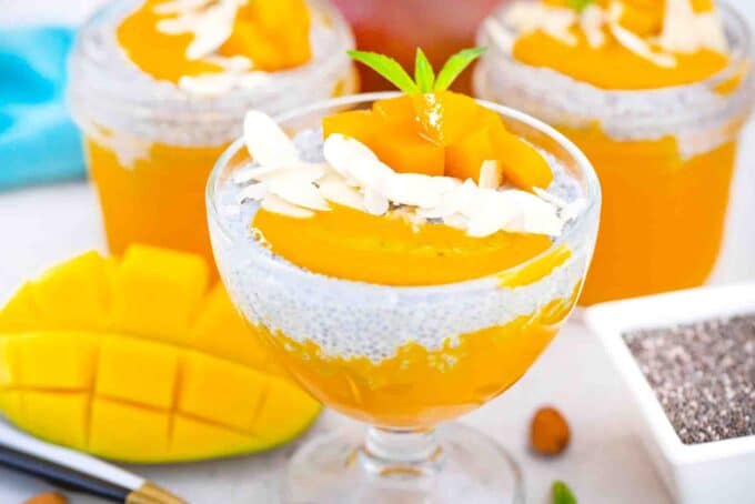 a bowl of mango chia pudding topped with mango