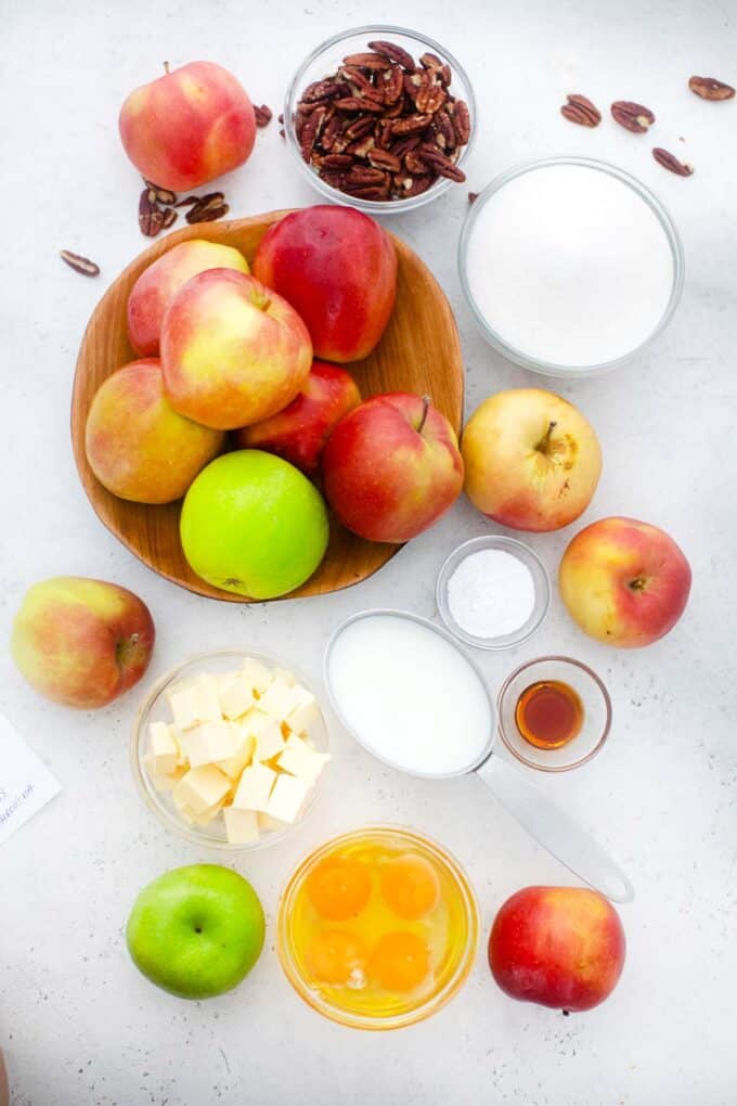 overhead shot of apple sheet cake ingredients in bowls on a table