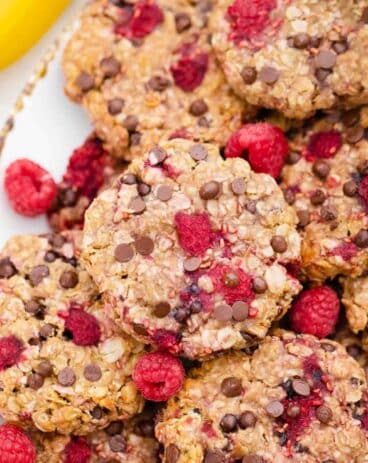 overhead shot of healthy raspberry cookies made with oatmeal chocolate chips and raspberries