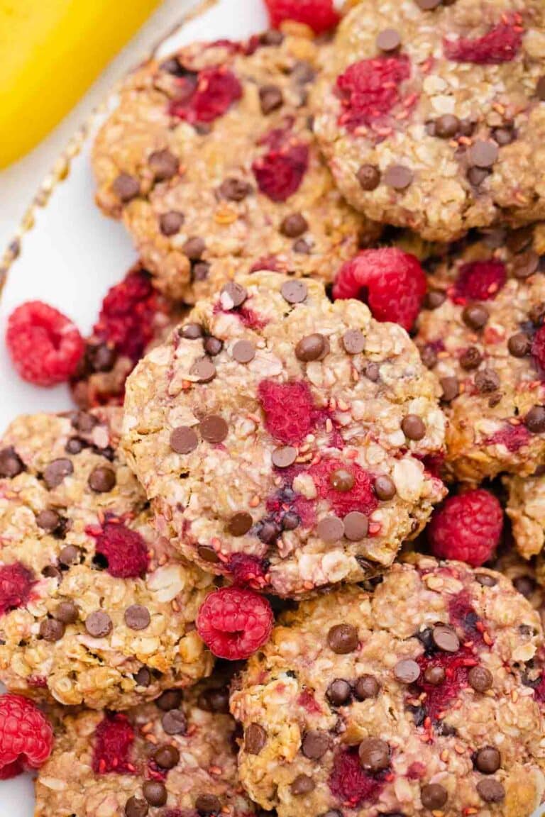 overhead shot of healthy raspberry cookies made with oatmeal chocolate chips and raspberries