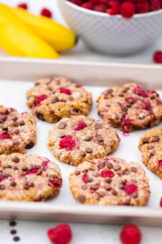 healthy raspberry cookies on a baking sheet