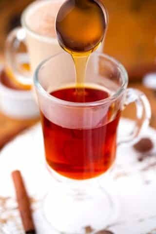 adding honey to earl grey tea