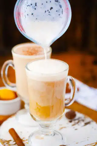 adding milk to earl grey tea to make london fog latte