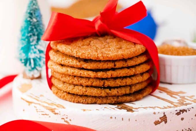 stack of molasses cookies with a red bow