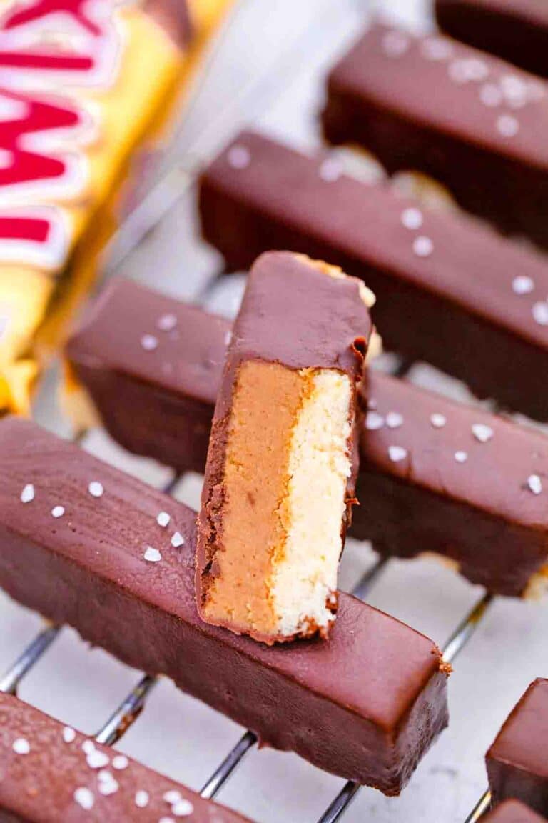 a sliced peanut butter twix bar revealing its layers