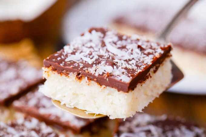 Coconut crack bar on a serving spatula.