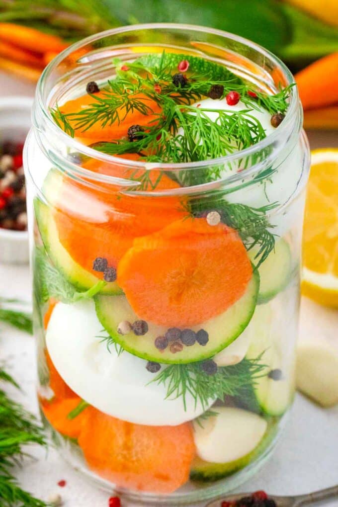 pickled eggs with zucchini, carrots, and dill