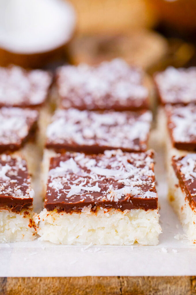 Coconut crack bars on a wooden board.