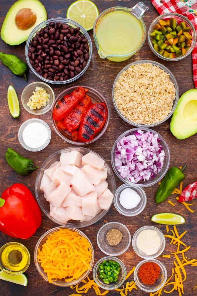 overhead shot of fiesta chicken ingredients in bowls on a table