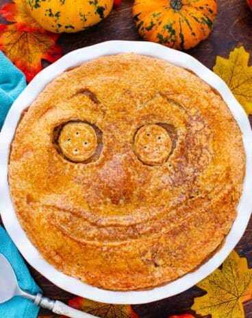 overhead shot of scary face halloween apple pie
