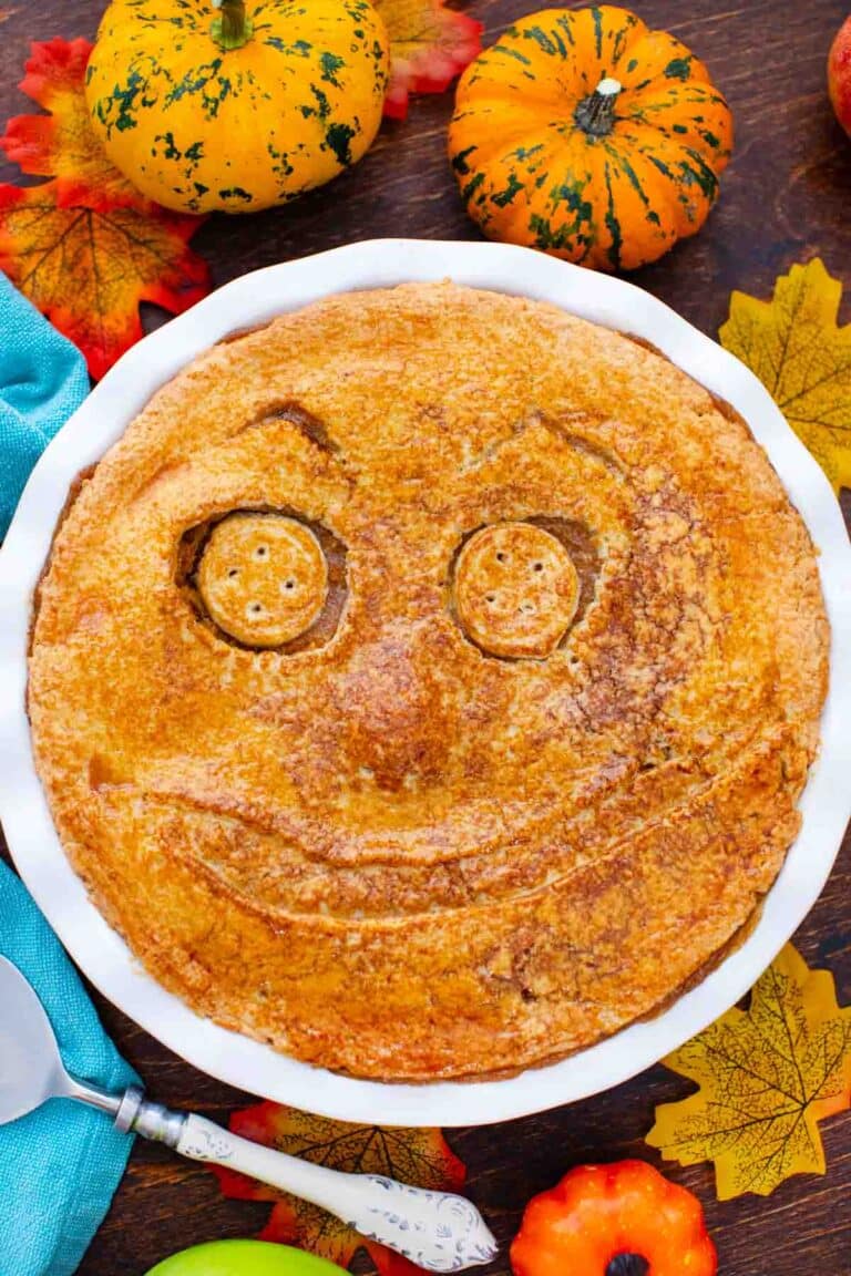 overhead shot of scary face halloween apple pie