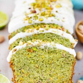 frontal shot of sliced green pistachio pound cake