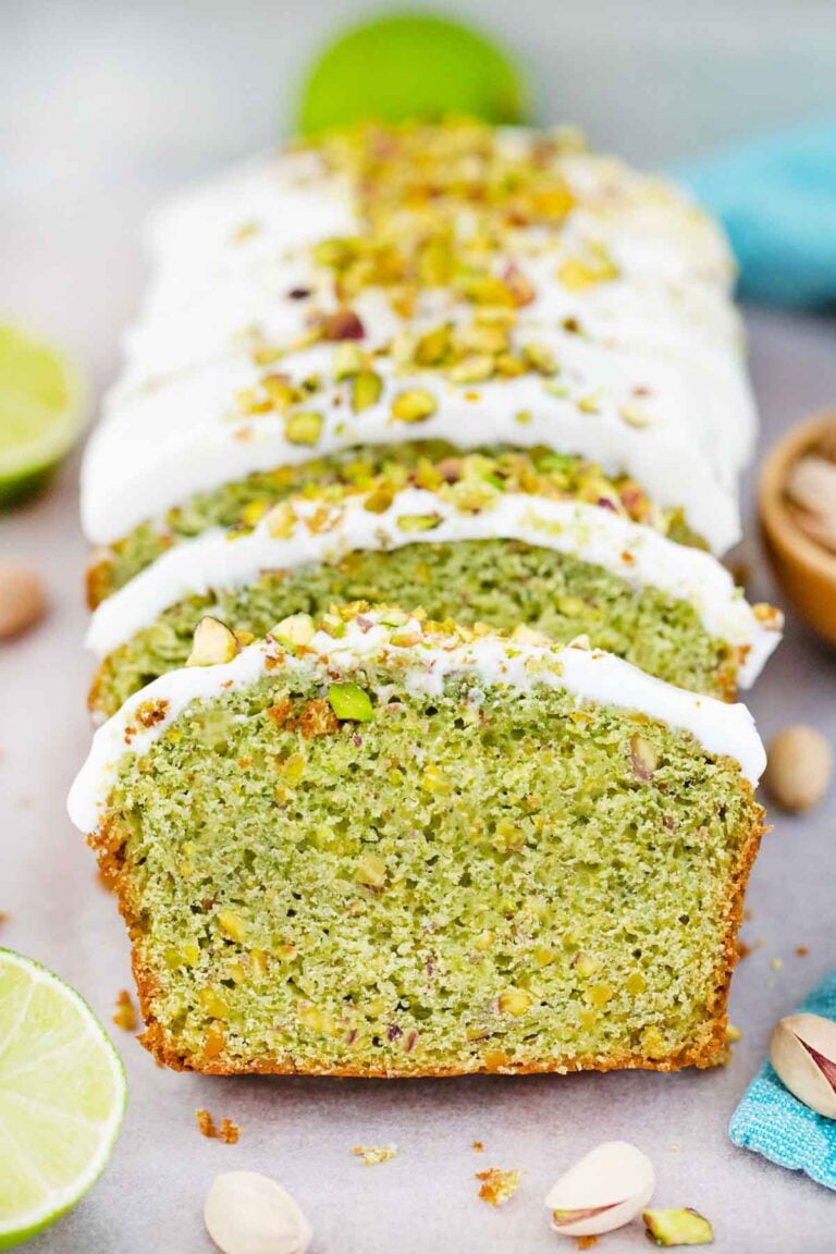 frontal shot of sliced green pistachio pound cake