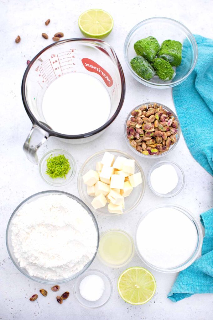 overhead shot of pistachio pound cake ingredients in bowls on a table