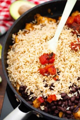 overhead shot of rice beans and veggies in a skillet