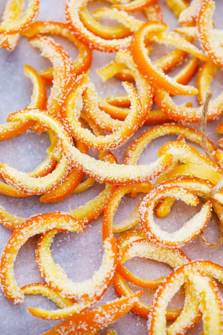 overhead shot of candied citrus peel on parchment paper