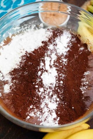 mixing flour and cocoa powder in a bowl