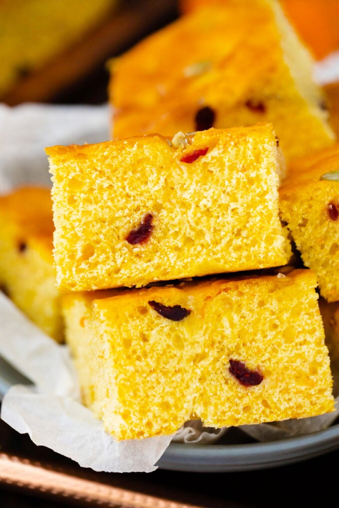 Slices of cranberry pumpkin focaccia with pumpkin seeds.