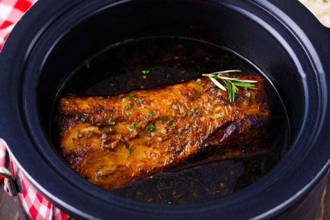 Juicy and perfectly cooked crockpot balsamic pork loin.