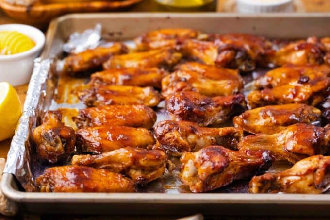 homemade honey garlic chicken wings on a baking sheet